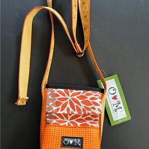 O LOVES M  Purse/ Water Bottle Combo.  Velcro enclosure. Adjustable Strap